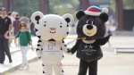 Tiger and bear Olympic mascot costume