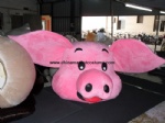 Pink pig head mascot